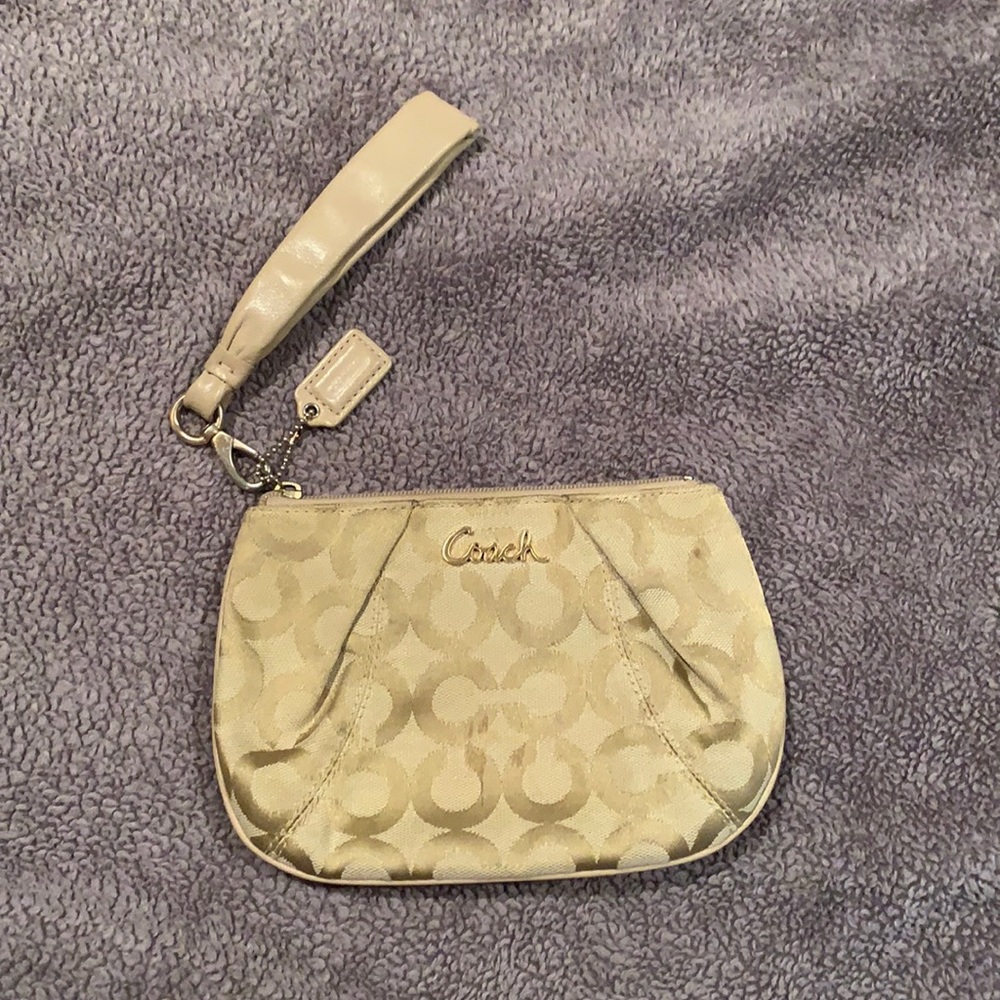 Coach tan wristlet. Barely worn.